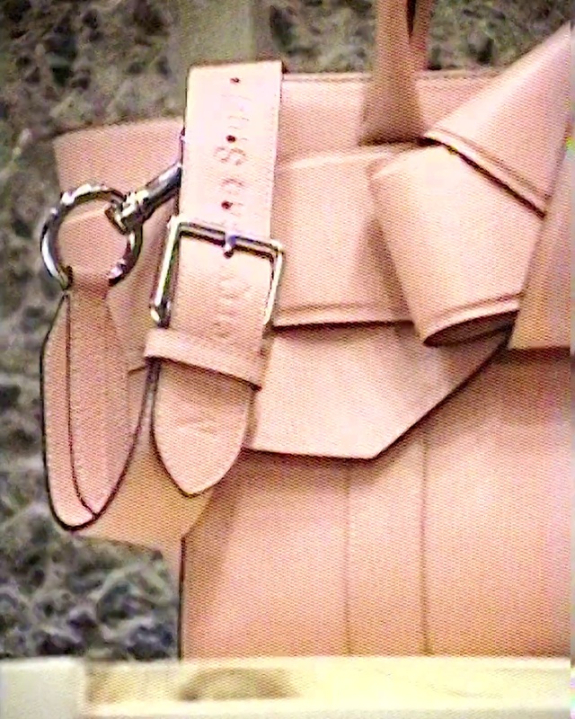 Video Reference: Brown, Bag, Textile, Beige, Orange, Natural material, Luggage and bags, Font, Material property, Shoulder bag