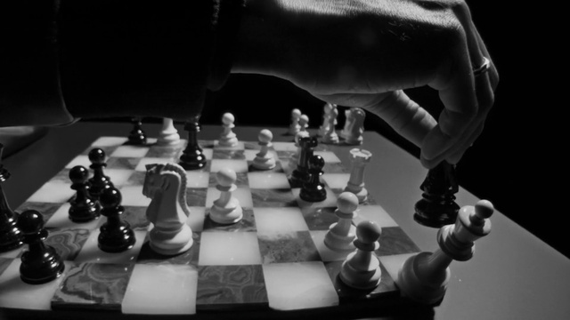 Video Reference: Sports equipment, Photograph, White, Table, Light, Black, Chessboard, Human, Chess, Style