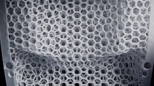 Video Reference: close-up, honeycomb pattern, hexagonal mesh, plastic lattice, geometric texture, abstract, white, gray, pattern, mesh, grid, industrial, material, surface, macro, texture