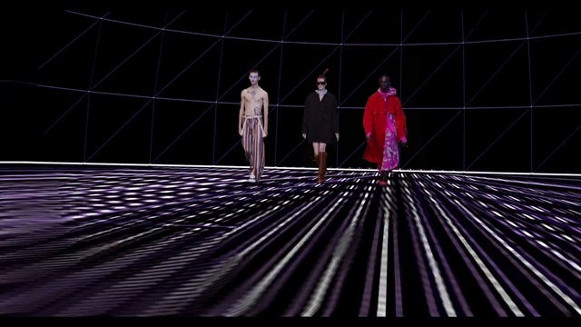 Video Reference: Flash photography, Dress, Entertainment, Performing arts, Fashion design, Space, Event, Pattern, Darkness, Electric blue