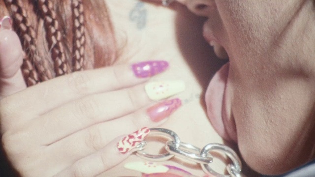 Video Reference: Skin, Body jewelry, Nail polish, Purple, Finger, Eyelash, Gesture, Nail, Pink, Thumb