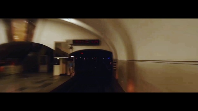 Video Reference: Sky, Tunnel, Tints and shades, Flooring, Road, Building, Symmetry, Space, Public transport, Automotive lighting