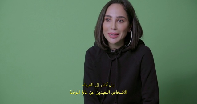 Video Reference: Cheek, Smile, Eye, Flash photography, Neck, Sleeve, Gesture, Happy, Electric blue, Magenta