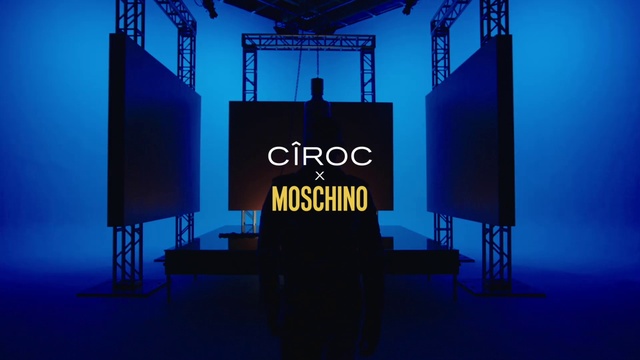 Video Reference: Blue, Architecture, Font, Display device, Technology, Electric blue, Event, Chair, Stage equipment, Stage