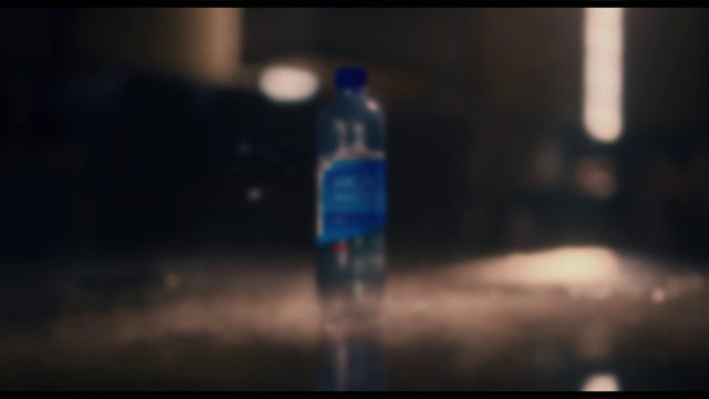 Video Reference: Liquid, Atmosphere, Water, Bottle, Automotive lighting, Drinkware, Sky, Plastic bottle, Vehicle, Asphalt