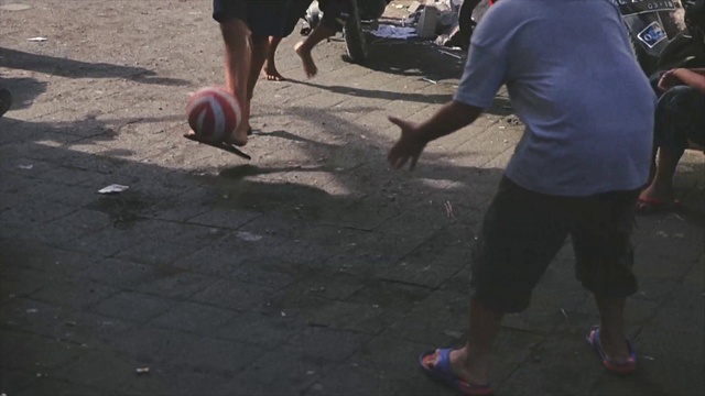 Video Reference: Shorts, Shoe, Leg, Sports equipment, Ball, Football, Volleyball, Sneakers, Sports toy, Soccer ball