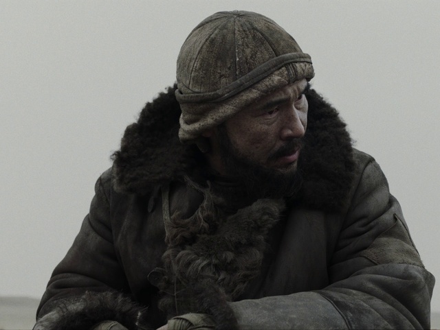 Video Reference: Outerwear, Cap, Gesture, Headgear, Beard, Monochrome photography, Monochrome, Facial hair, Winter, Comfort