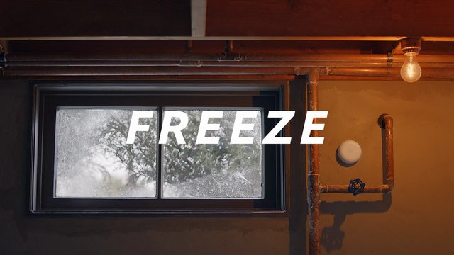 Video Reference: interior, window, frosted glass, pipes, light bulb, rustic, industrial, wall, text overlay, freeze, cold, home interior, utility, basement, minimal