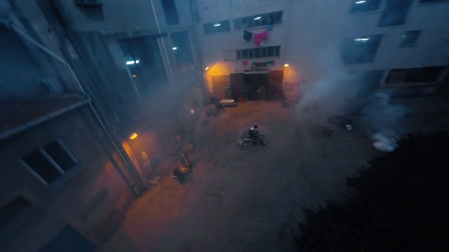 Video Reference: Atmosphere, Automotive lighting, Window, Road surface, Street light, Building, Fog, Asphalt, Gas, Geological phenomenon