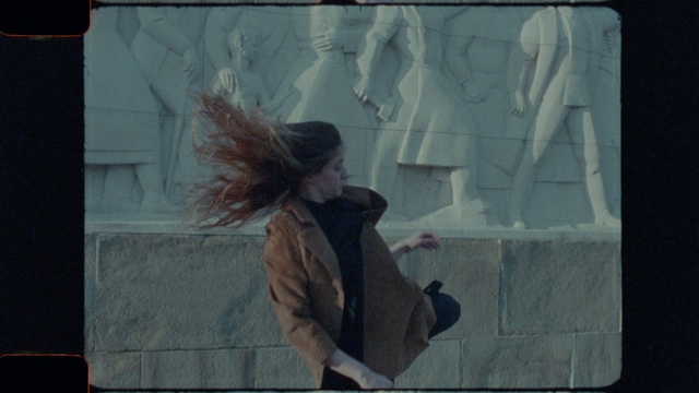 Video Reference: Textile, Rectangle, Coat, Window, Gesture, Grey, Wall, Street fashion, Tints and shades, Art