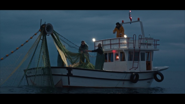 Video Reference: Boat, Sky, Watercraft, Naval architecture, Vehicle, Ship, Flag, Water, Dusk, Water transportation