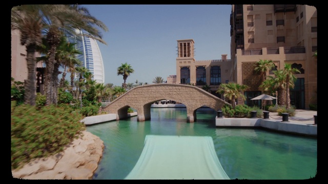 Video Reference: Water, Sky, Plant, Building, Property, Tree, Nature, Body of water, Arecales, Condominium