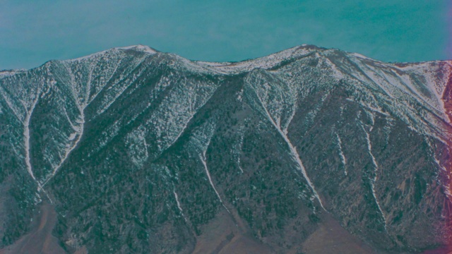 Video Reference: Azure, Mountain, Plant, Slope, Wing, Landscape, Hill, Mountain range, Natural landscape, Massif