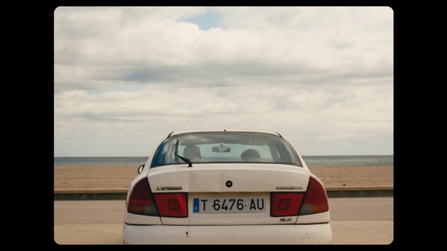 Video Reference: Automotive parking light, Cloud, Sky, Vehicle registration plate, Automotive tail & brake light, Vehicle, Automotive lighting, Hood, Motor vehicle, Car