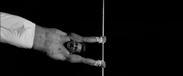 Video Reference: Head, Hand, Leg, Flash photography, Performing arts, Entertainment, Gesture, Elbow, Chest, Rope