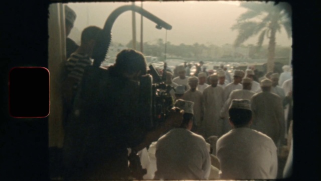 Video Reference: Sky, Hat, Mode of transport, Tints and shades, T-shirt, Event, Crowd, Fun, Travel, Tree