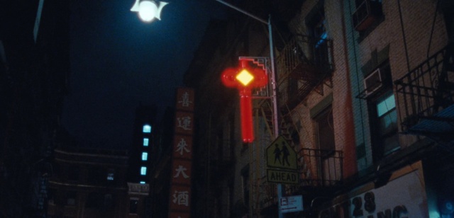 Video Reference: Building, Window, Automotive lighting, Electricity, Sky, City, Midnight, Traffic light, Electronic signage, Facade