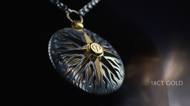 Video Reference: Gas, Font, Electric blue, Jewellery, Circle, Metal, Necklace, Body jewelry, Fashion accessory, Darkness