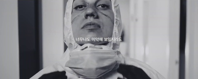 Video Reference: Shoulder, Mouth, Human, Neck, Eyelash, Jaw, Sleeve, Gesture, Style, Black-and-white