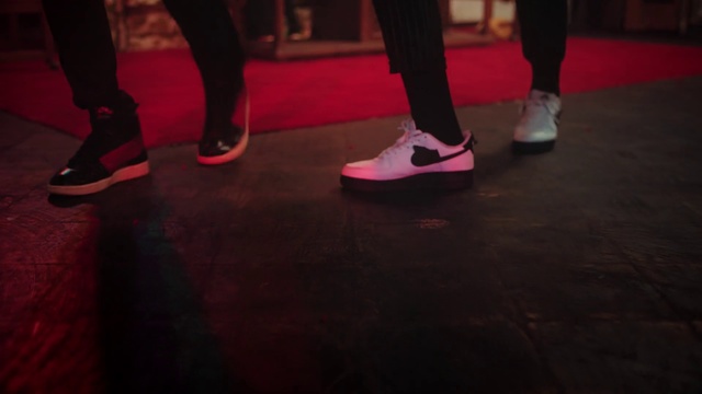 Video Reference: Footwear, Shoe, Leg, Entertainment, Standing, Thigh, Flooring, Performing arts, Magenta, Human leg