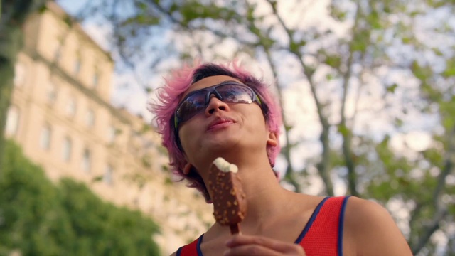 Video Reference: Glasses, Lip, Vision care, Eyewear, Happy, Sunglasses, Gesture, Sunlight, Pink, Grass