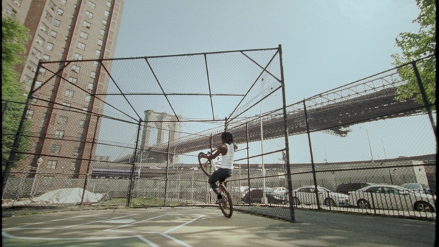 Video Reference: Wheel, Tire, Sky, Vehicle, Rolling, Mesh, Sports, Tree, Recreation, Road