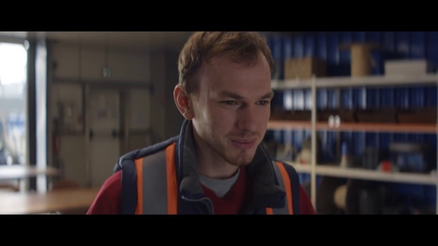 Video Reference: Forehead, Flash photography, Jaw, Beard, Facial hair, Electric blue, Shelf, Fun, Conversation, Sitting