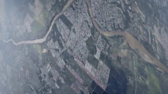 Video Reference: Grey, Urban design, Landscape, Geological phenomenon, City, Birds-eye view, Geology, Air travel, Pattern, Aerial photography