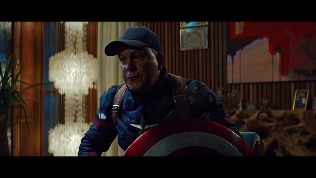 Video Reference: Shield, Captain america, Cap, Fun, Baseball cap, Electric blue, Event, Games, Personal protective equipment, Eyewear