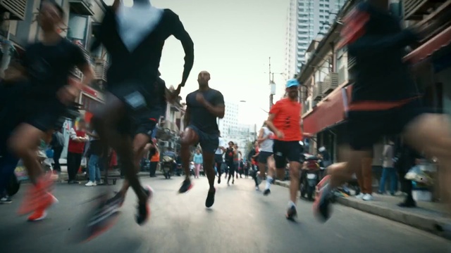 Video Reference: Shorts, Sky, Recreation, Exercise, Crowd, Thigh, Fun, Road, Physical fitness, Athlete