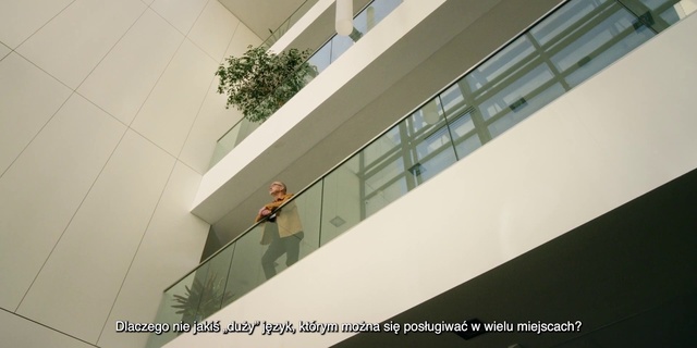 Video Reference: Building, Window, Rectangle, Urban design, Fixture, Material property, Facade, Shade, Tints and shades, Composite material