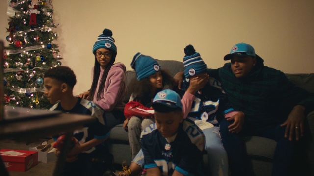 Video Reference: Christmas tree, Cap, Baseball cap, T-shirt, Tree, Event, Christmas decoration, Fun, Leisure, Conifer