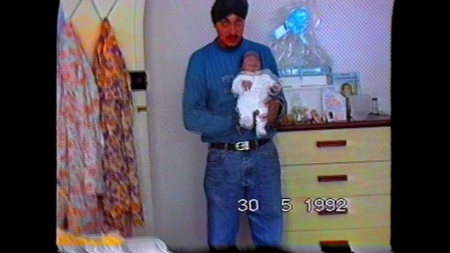 Video Reference: Shoulder, Purple, Sleeve, Cabinetry, Beard, T-shirt, Carnivore, Trunk, Electric blue, Belt