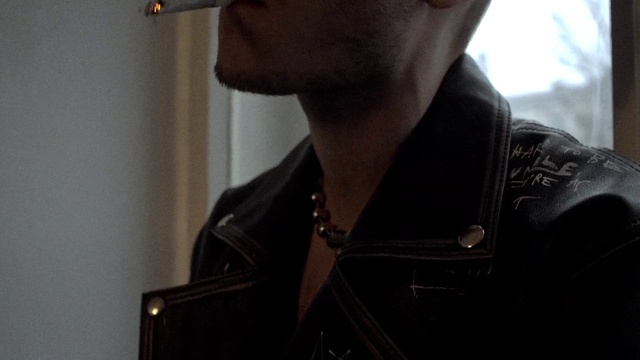 Video Reference: Neck, Eyewear, Sleeve, Beard, Dress shirt, Vision care, Grey, Headgear, Cool, Flash photography