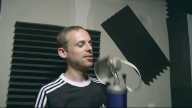 Video Reference: Hairstyle, Jaw, Standing, T-shirt, Cool, Flash photography, Art, Fun, Audio equipment, Sportswear