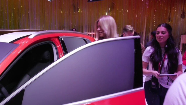 Video Reference: Automotive design, Vehicle, Motor vehicle, Suit, Automotive lighting, Vehicle door, Magenta, Personal luxury car, Eyewear, Event