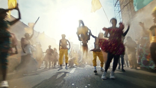 Video Reference: Sky, Crowd, Event, Fun, Performing arts, Entertainment, City, Road, Leisure, Public event