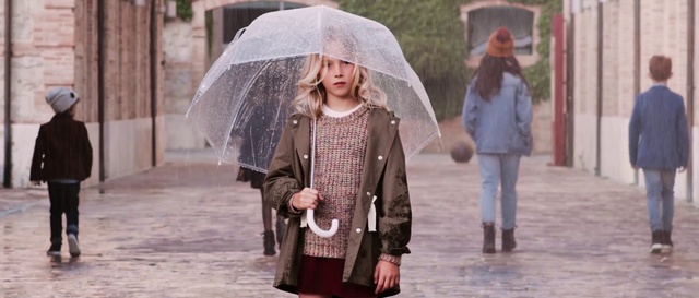 Video Reference: Clothing, Outerwear, Hairstyle, Umbrella, Facial expression, Water, Human, Street fashion, Standing, Pink