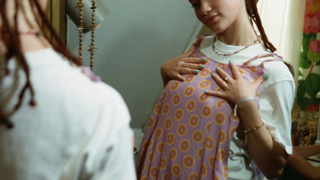 Video Reference: Textile, Sleeve, Smile, Happy, Eyelash, Fashion design, Eyewear, Necklace, Jewellery, Pattern