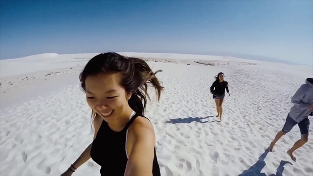 Video Reference: Smile, Sky, Vertebrate, Snow, People in nature, Slope, Standing, Outdoor recreation, Travel, Ice cap