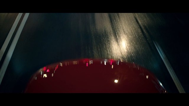 Video Reference: night, road, driving, wet road, vehicle hood, reflection, lane markings, traffic, motion blur, dark, rain, highway, transportation