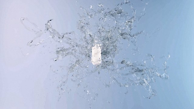 Video Reference: liquid, splash, water, bottle, white bottle, blue background, abstract, motion, fluid, product shot, aqua, fresh, clean, transparent, studio, minimal