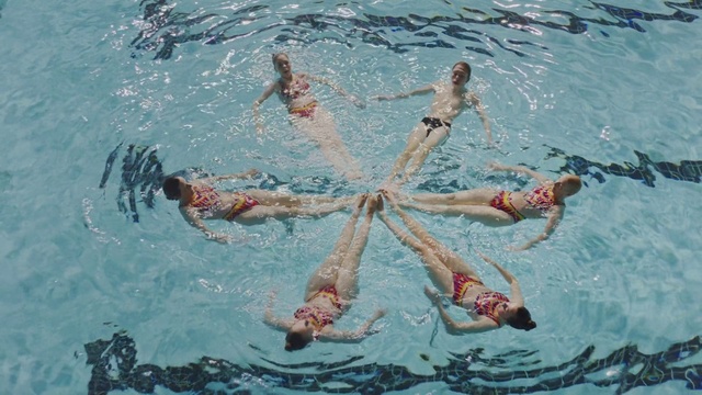 Video Reference: Water, Swimming pool, Liquid, Swimmer, Azure, Swimwear, Medley swimming, One-piece swimsuit, Outdoor recreation, Swim cap