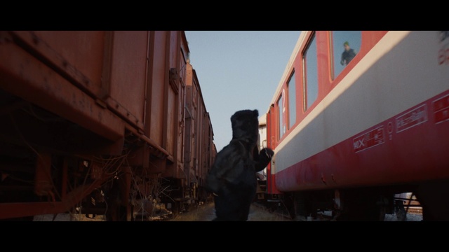 Video Reference: Train, Building, Rolling stock, Track, Railway, Rolling, Railroad car, Automotive lighting, Sky, Locomotive