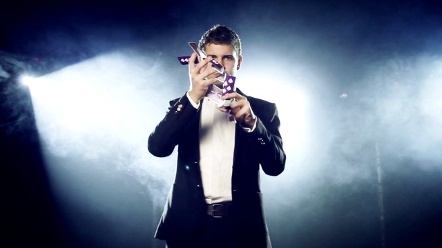 Video Reference: Clothing, Hand, Arm, Human body, Flash photography, Entertainment, Music artist, Microphone, Standing, Music