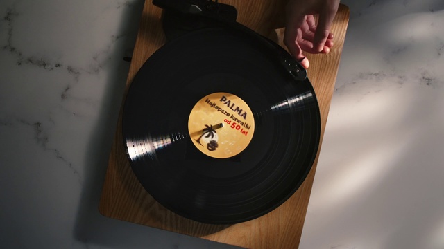 Video Reference: Gramophone record, Publication, Circle, Record player, Composite material, Audio equipment, Wood, Metal, Gas, Data storage device