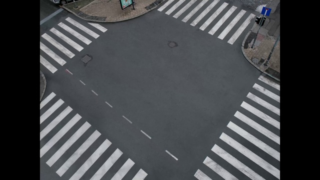 Video Reference: White, Light, Black, Road surface, Asphalt, Line, Rectangle, Urban design, Parallel, Road