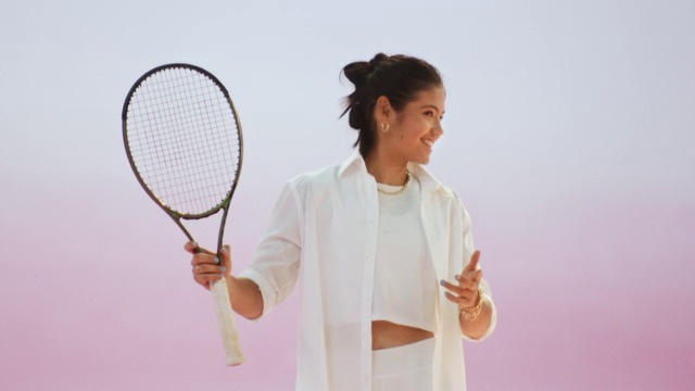 Video Reference: Hair, Hand, Shoulder, Strings, Sleeve, Gesture, Audio equipment, Happy, Racket, Finger