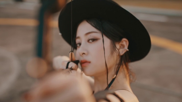Video Reference: Lip, Chin, Hairstyle, Eyebrow, Eyelash, Fedora, Flash photography, Neck, Vision care, Hat