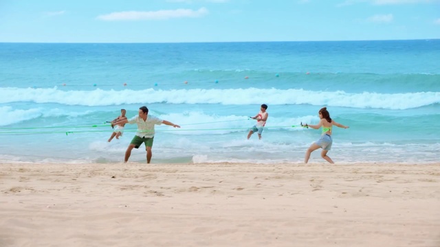 Video Reference: Water, Sky, Cloud, People on beach, Beach, Natural environment, Body of water, Coastal and oceanic landforms, Leisure, Morning